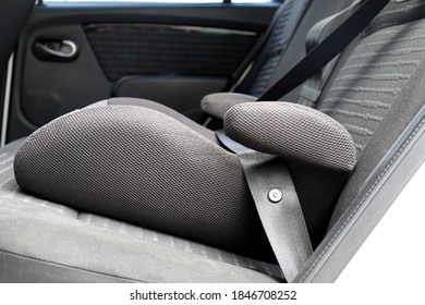 Safety Booster Seat For Children. Car Interior.