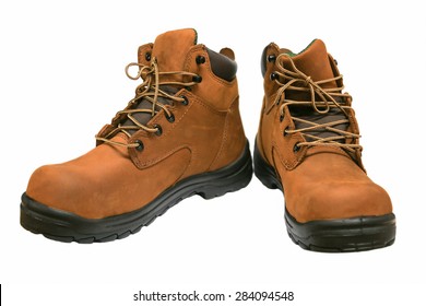 Safety Boots Isolated On White Background, Close Up New Boots On White Background, Worker Used Boots Shoe In Heavy Industry For Protected Them Foot.