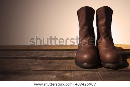 Similar – rubber boot meetings Boots