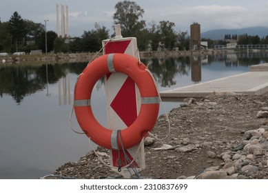 a safety buoy or life buoy for rescuing people at the beach - Shutterstock ID 2310837699