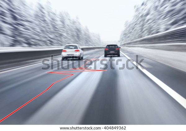 Safety car overtaking on highway with heart\
health pulse on slippery asphalt road. Motion blur visualizies the\
speed and dynamics.
