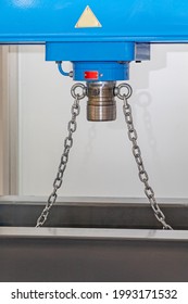 Safety Chains At Hydraulic Press Equipment In Work Shop