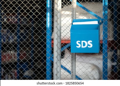 "Safety data sheet (SDS)" box which is use to placed chemical characteristic documents that locate in front of chemical storage room. Industrial object photo.  - Shutterstock ID 1825850654