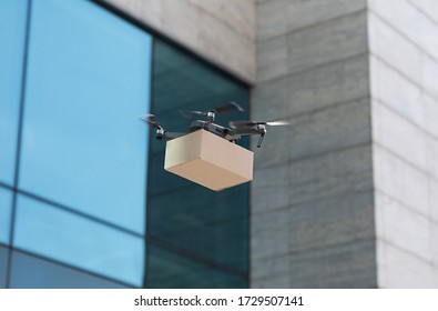 Safety Drone Delivery In The City, Quadrocopter Or Drone Delivering Package, Copy Space