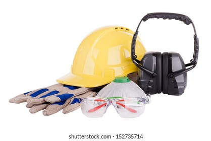 Safety Equipment Or PPE - Personal Protective Equipment - With Hard Hat, Safety Glasses, Gloves, Face Mask And Earmuffs Isolated On White