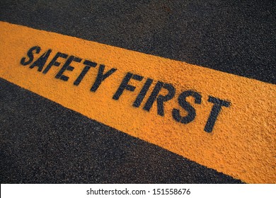 Safety First sign on caution strip.  - Shutterstock ID 151558676