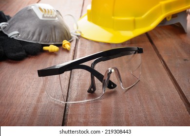 Safety Glasses On Wooden Plank