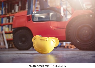 Safety Hard Hat Helmet On Floor In Industrial Warehouse Factory. First Aid And Safety First. Health Insurance Emergency Accident. 