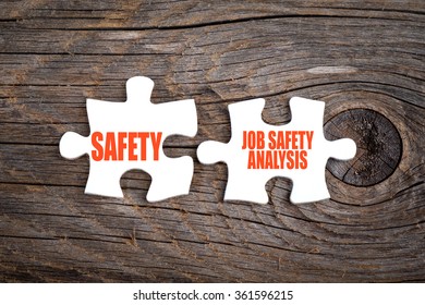 Safety And Job Safety Analysis - Words On Puzzle.Conceptual Image.