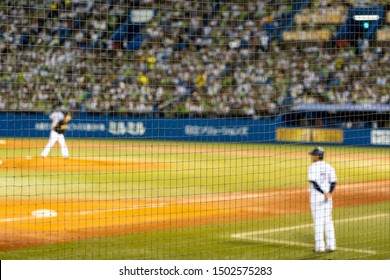 Safety Net And Blurred Baseball Game On A Stadium 