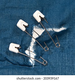 Safety Pins Holding Torn Fabric Together Stock Photo 203939167 ...
