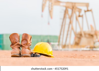 Safety Shoes And Hard Hat That Is Safety Equipment In Oilfield