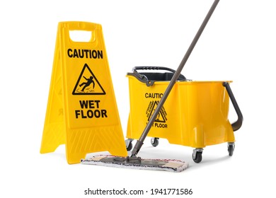 Safety sign with phrase Caution wet floor, mop and bucket on white background. Cleaning service - Powered by Shutterstock