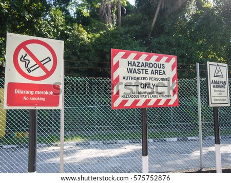 Safety signage for hazardous chemical and hazardous waste storage in bilingual language, Malay & English. 