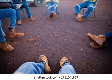 Safety Workplace Top View Clear Pic Of Worker Safety Boot Setting On The Chair Maintains 1.5 Metre Or 6 Feets Social Distancing Prevention Of Coronavirus -19 During Prestating Morning Shift 