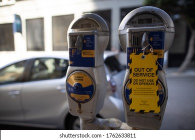 Safety Workplaces Yellow Out Of Service Tag Attached On Faulty Damage Of Defect Car Parking Metre Perth, Australia