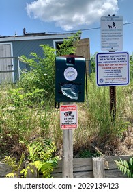 Sag Harbor, NY, USA, 7.24.21 - Signs Posted From The Town Of Southampton Listing The Rules And Regulations Of Foster Memorial Beach. There Are Also Free Baggies Provided For Dog Poor And Bathrooms.