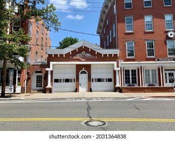 Sag Harbor, NY, USA, 8.6.21 - The Exterior Of The Sag Harbor Fire Department Located In Town. The Historical Building Is Made Of Bricks And Has Two Garage Doors For The Fire Trucks To Come And Go.