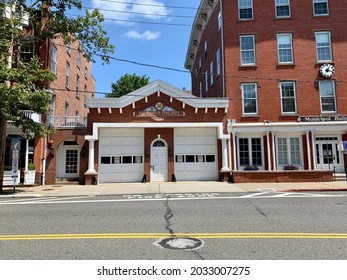 Sag Harbor, NY, USA, 8.6.21 - The Exterior Of The Sag Harbor Fire Department Located In Town. The Historical Building Is Made Of Bricks And Has Two Garage Doors For The Fire Trucks To Come And Go.