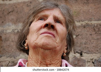 Sage old woman calls up old memories - Shutterstock ID 18842074