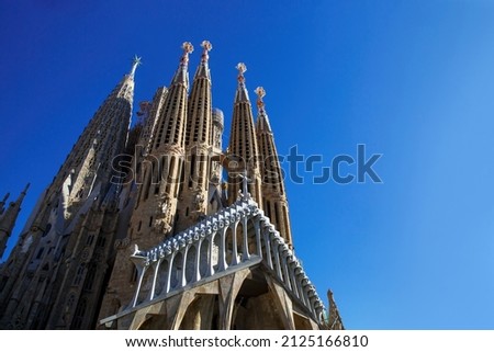 The Sagrada Familia temple in Barcelona, Spain. Blue sky background