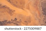 Sahara Desert in Algeria aerial view. Earth landscape. Selective focus included. Elements of this image furnished by NASA.
