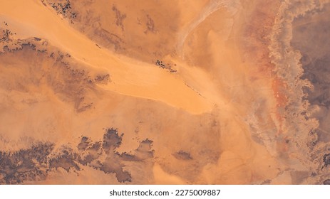Sahara Desert in Algeria aerial view. Earth landscape. Selective focus included. Elements of this image furnished by NASA. - Shutterstock ID 2275009887