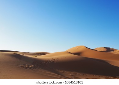 Sahara desert and camel riding (Erg Chebbi, Morocco) - Powered by Shutterstock