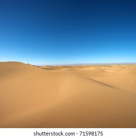 Sahara Desert Close To Merzouga In Morocco With Blue Sky And Clouds