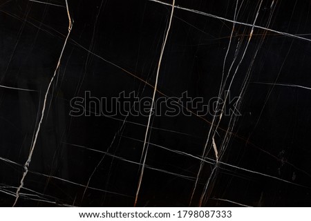 Sahara noir - natural marble stone, photo of slab texture for perfect interior of background.