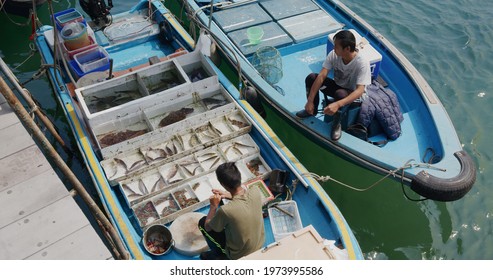 Sai Kung, Hong Kong 30 March 2021: Top Down View Of Fishing Boat Selling Seafood