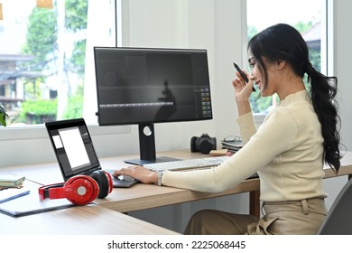 Said View Of Asian Woman Video Editor Working With Footage And Sound In Post Production Software