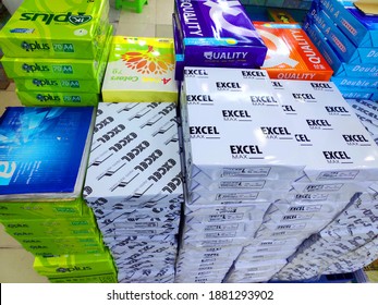 Saigon 01 Dec 2020: Assorted brands of A4 paper Aplus, Double A office paper block for sale on a shelves at hypermarket office shop store. Stationary Shop with Writing Materials Paper, Office Supplies