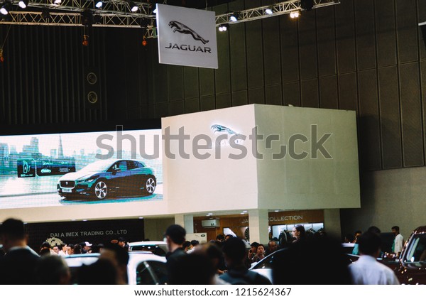 SAIGON EXHIBITION AND\
CONVENTION CENTER (SECC), HO CHI MINH CITY, VIETNAM - OCTOBER 2018:\
Logos of Jaguar with modern abstract background at Vietnam\
Motorshow 2018 event