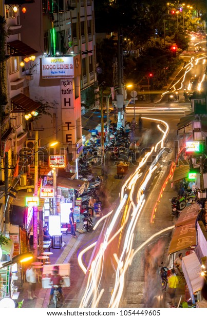 SAIGON, VIETNAM, DEC 13 2017,\
Traffic in the streets of Saigon City. Life in night Ho Chi Minh\
city.
