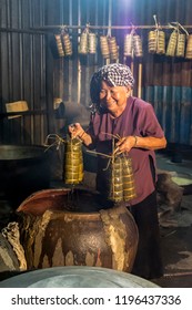 SAIGON, VIETNAM - FEB 13, 2018 - The vietnamese woman is cooking Banh Tet which preparing for TET holiday is a must have traditional food in Vietnamese Lunar New Year