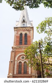 SAIGON, VIETNAM - MARCH 26, 2017: 
Narrow View Of Notre-Dame Cathedral Basilica Of Saigon Is About Roman Catholic French Conquest Of Religion Located On Archdiocese Of Ho Chi Minh City.