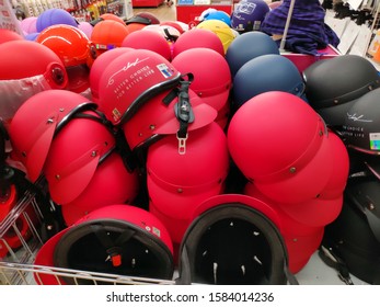 Saigon/Vietnam: 1May19: Pile Of Red And Black Helmets In Supermarket Head Protection In Transportation Accessories 