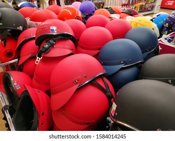 Saigon/Vietnam: 1May19: Pile Of Red And Black Helmets In Supermarket Head Protection In Transportation Accessories 