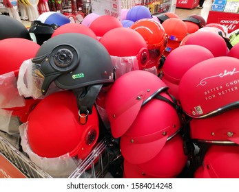 Saigon/Vietnam: 1May19: Pile Of Red And Black Helmets In Supermarket Head Protection In Transportation Accessories 