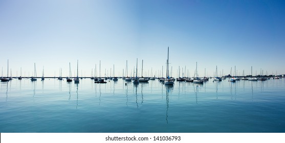 Sail Boats on a beautiful cloudless day in the marina - Shutterstock ID 141036793