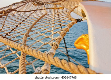 Sail Ship Bow With Net And Figurehead On The Baltic Sea