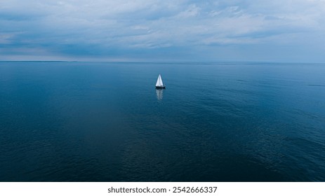 Sailboat in blue abyss middle of the ocean high resolution calm water screen saver serenity set sail voyage pacific atlantic ocean. - Powered by Shutterstock