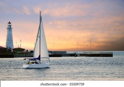 sailboat leaving marina - Powered by Shutterstock