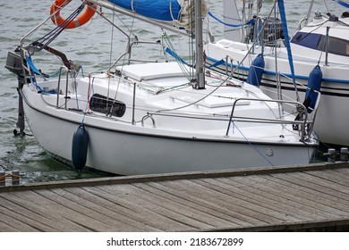 Sailboat Moored In Port - Front View