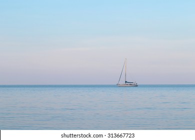sailboat on the sea in twilight