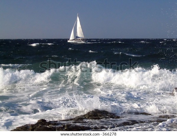 sailboat in rough seas