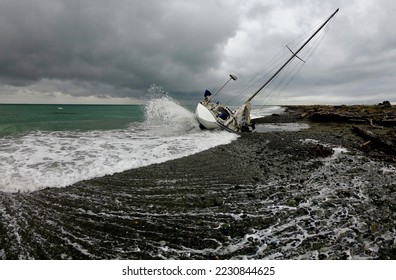 sailboat run aground on Dungeness spit - Shutterstock ID 2230844625