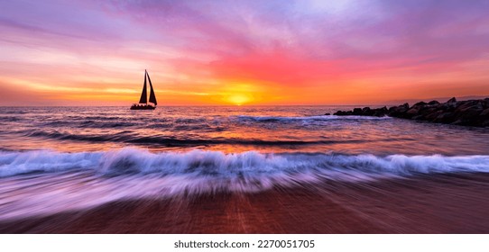 A Sailboat Is Sailing Along The Ocean With A Wave Breaking On Shore Banner - Powered by Shutterstock