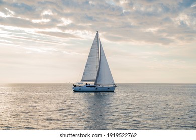 Sailboat in the sea in the sunset, luxury summer adventure, in Mediterranean sea, Europe
